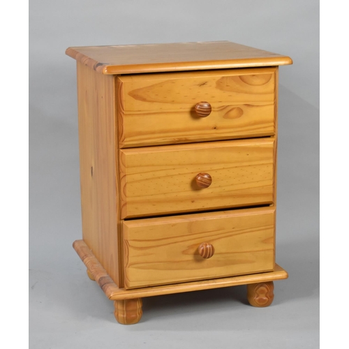 238 - A Pine Three Drawer Bedside Chest, 46cms Wide