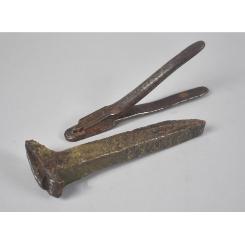 36 - A LMS Ticket Punch and Early Forged Railway Spike from the Tal-Y-Llyn Railway, c.1865/70