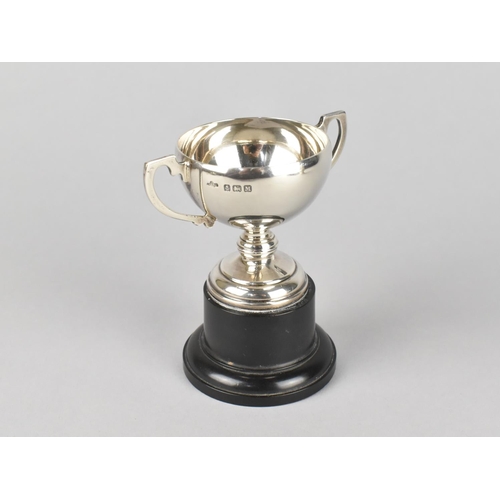 372 - A Small Silver Trophy on Plinth Base, 9cm high