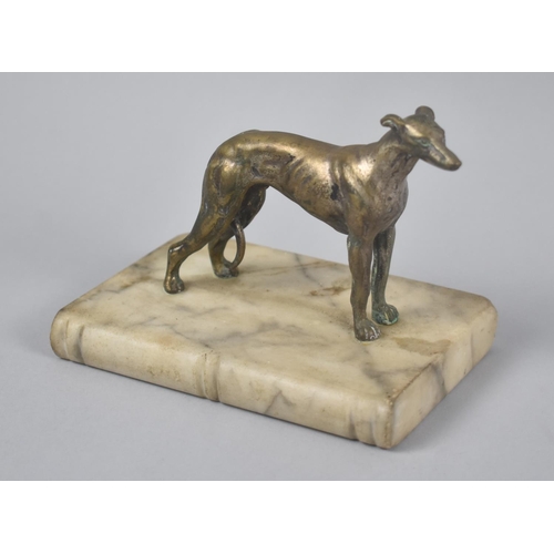 43 - A Formerly Silver Plated Figure of a Standing Greyhound on Carved Marble Plinth in the Form of a Boo... 