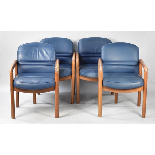 499 - A Set of Four Gordon Russell Teak Framed and Leather Upholstered Armchairs