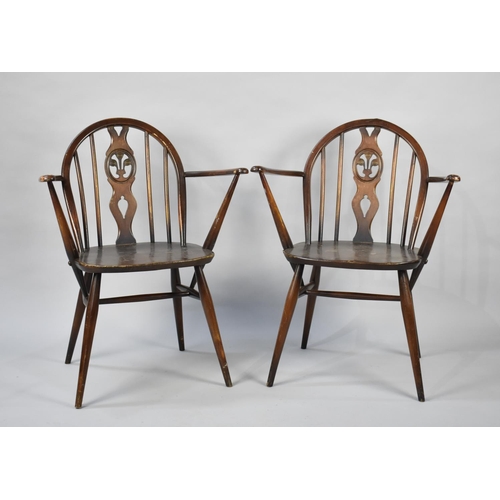 511 - A Pair of Ercol Fleur De Lys Back Arm Chairs