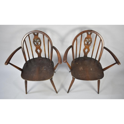 511 - A Pair of Ercol Fleur De Lys Back Arm Chairs