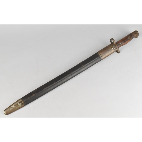 55 - A British 1907 Pattern Bayonet with Crown Stamp and Leather Scabbard