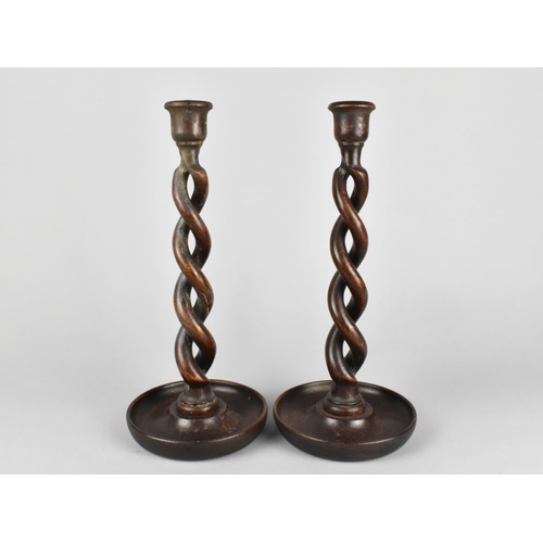 6 - A Pair of Edwardian Oak Open Spiral Candlesticks, 30cms High