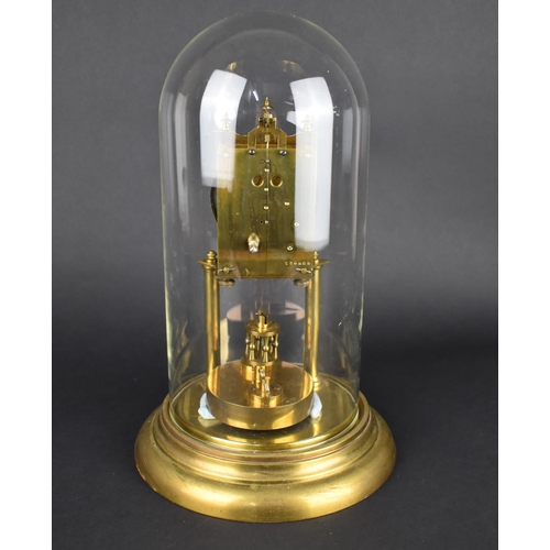 64 - A Mid 20th Century Brass Pillar Clock under Glass Dome, Overall Height 31cms