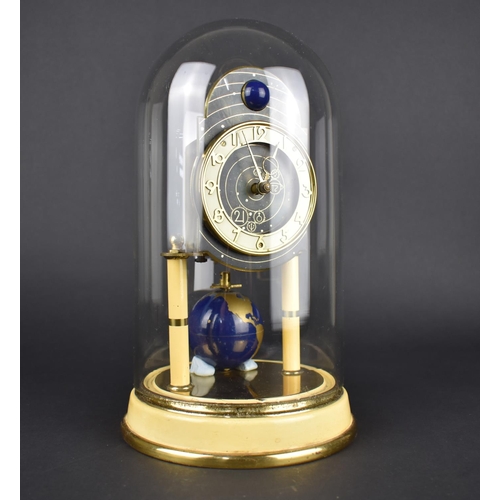 65 - A Mid 20th Century Brass and Cream Enamelled Pillar Clock with Globe Weight Under Glass Dome, 27cms ... 