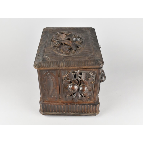 7 - A Late 19th Century Black Forest Carved Cigar Cabinet with Lift Up Lid, Hinged Side Quadrants and Ba... 