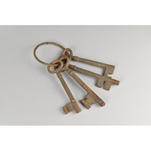 87 - A Collection of Four Early 19th Century Door Keys