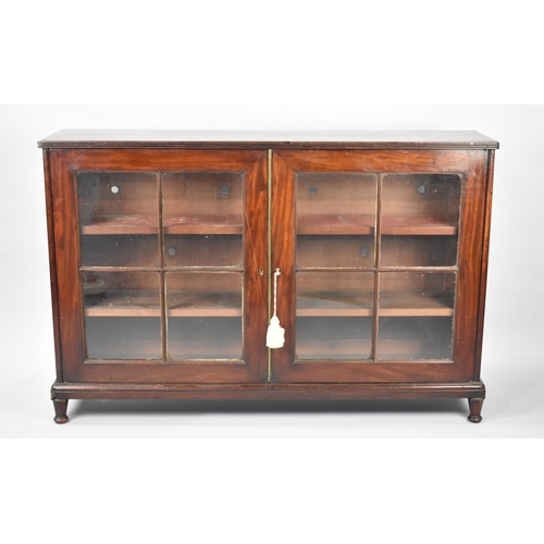 91 - A Edwardian Mahogany Glazed Two Shelf Bookcase, 130cms Wide and 85.5cms High