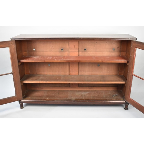 91 - A Edwardian Mahogany Glazed Two Shelf Bookcase, 130cms Wide and 85.5cms High