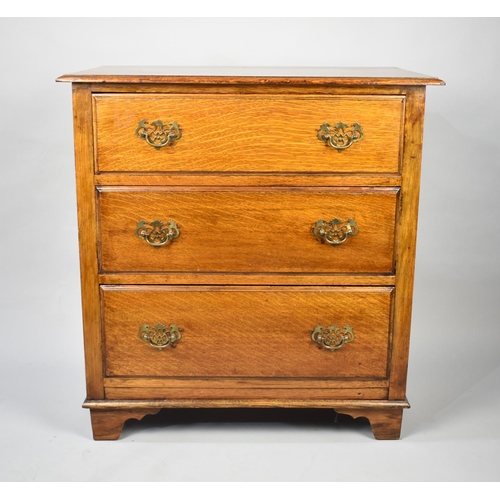 101 - A Mid 20th Century Oak Three Drawer Chest, 73cms Wide