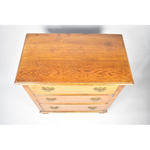 101 - A Mid 20th Century Oak Three Drawer Chest, 73cms Wide