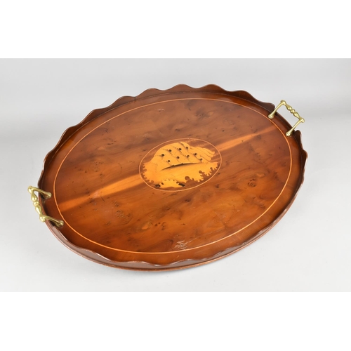 122 - A Nice Quality Shell Inlaid Oval Mahogany Two Handled Tray with Wavy gallery, 59cms Wide