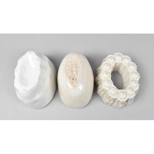 142 - Three Late Victorian White Glazed Jelly Moulds