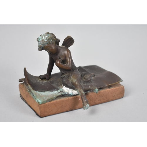 16 - A Small Patinated Bronze Figure of Cupid Seated on Letter, Signed Ferrand for Ernest Justin Ferrand ... 