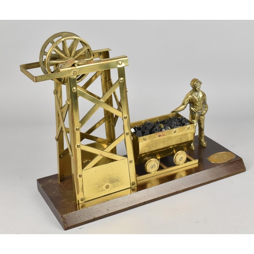 2 - A Vintage Brass Model of Welsh Miner, Coal Cart and Pit Head on Wooden Plinth, 33cms Wide