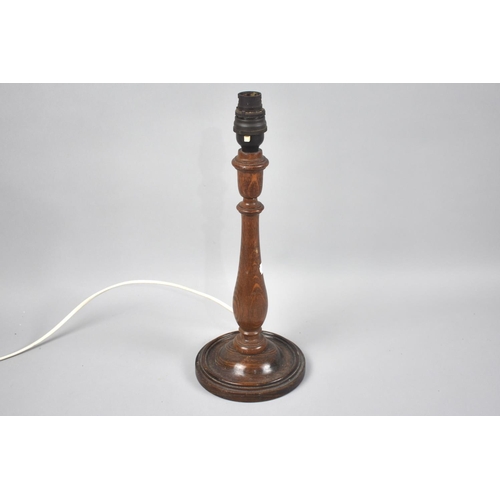 236 - An Early/Mid 20th Century Turned Oak Table Lamp, 38cms High