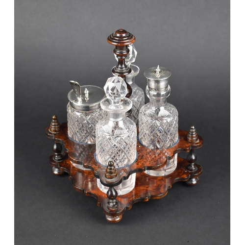 24 - A Pretty Burrwood Four Bottle Cruet, 15cms Square and 21cms High