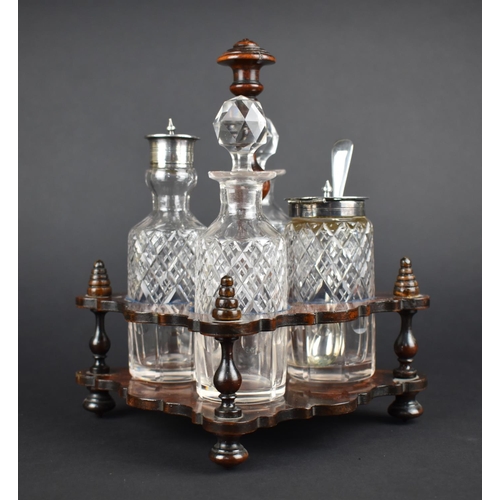 24 - A Pretty Burrwood Four Bottle Cruet, 15cms Square and 21cms High