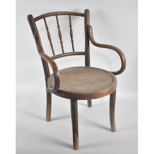 243 - A Mid 20th Century Circular Seated Childs Bentwood Armchair with Spindle Back