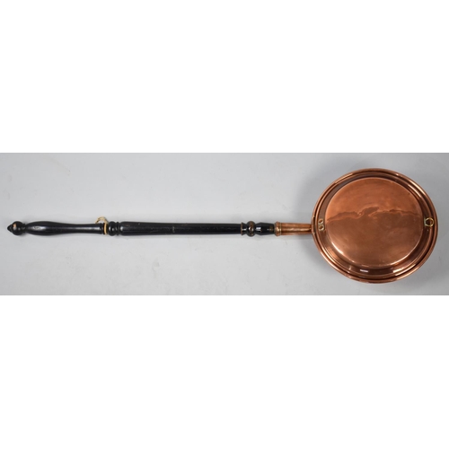 252 - A Copper Bed Warming Pan with Ebonised Turned Handle