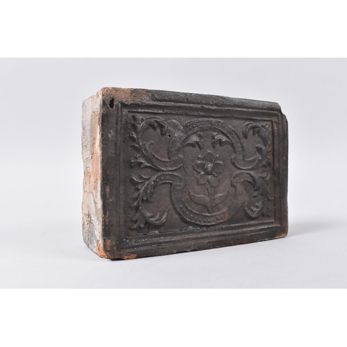 29 - An Early Moulded Fireplace Brick, Continental and Probably Flemish, 14x10cms and 5cms Deep