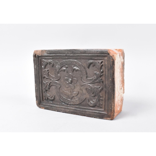 29 - An Early Moulded Fireplace Brick, Continental and Probably Flemish, 14x10cms and 5cms Deep