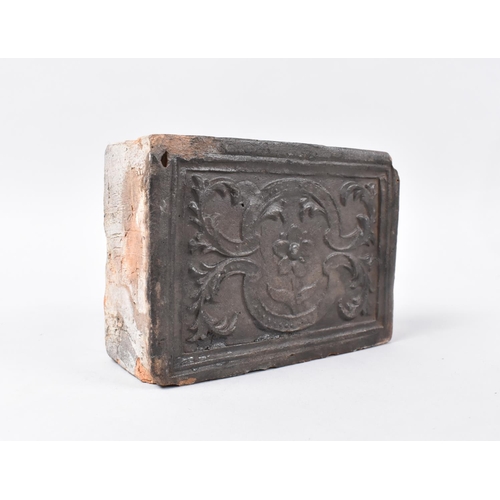 29 - An Early Moulded Fireplace Brick, Continental and Probably Flemish, 14x10cms and 5cms Deep