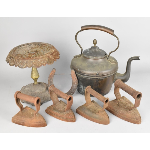 320 - A Collection of Various Metalwares to Comprise Flat Irons, Victorian Kettle Stand with Brass Taperin... 