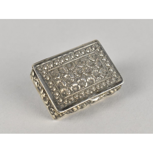 351 - A Small Silver Box with Floral Decoration, London Import Mark, 925 by RR, 4cm wide