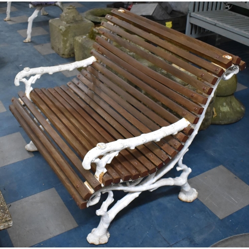 382 - A White Painted Cast Iron Coalbrookdale Style Bench with Slatted Curved Seat, 87cm wide