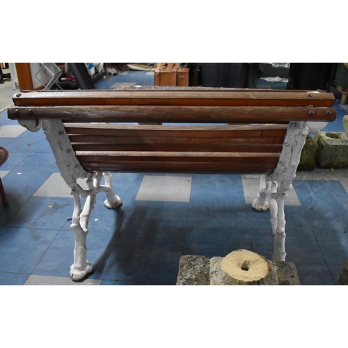 382 - A White Painted Cast Iron Coalbrookdale Style Bench with Slatted Curved Seat, 87cm wide