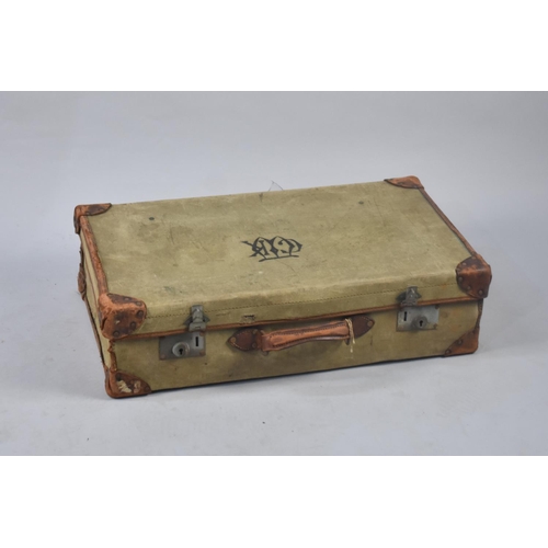 408 - A Vintage Canvas and Leather Covered Suitcase Containing Various Table Mats Etc