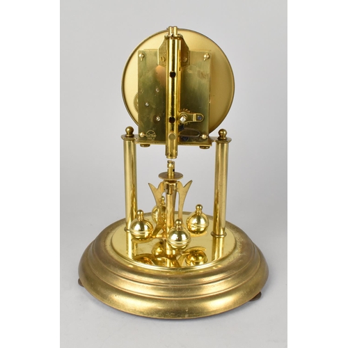 41 - A Mid 20th Century German Koma Brass Pillar Clock under Glass Dome, with Key, 30cms High