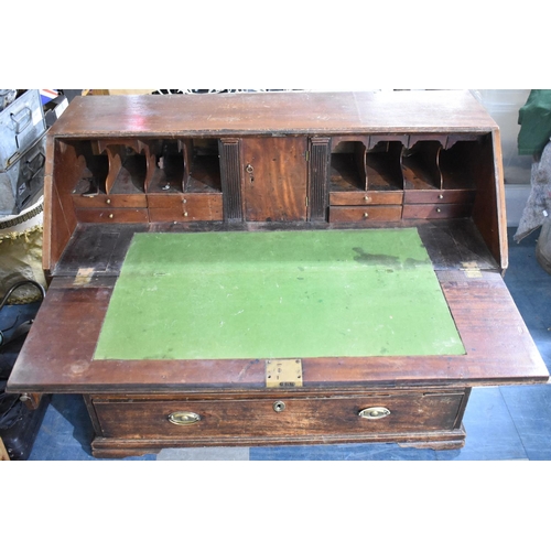 424 - A 19th Century Fall Front Bureau with Fitted Interior to include Secret Compartments, Four Long Grad... 