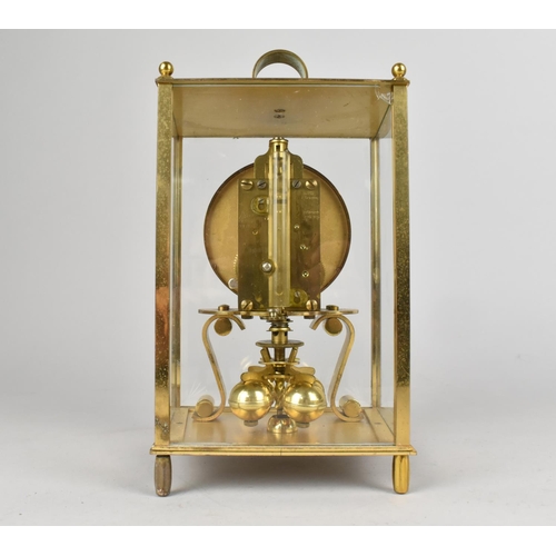 56 - A Mid 20th Century Brass Cased Four Glass Pillar Clock by Kundo, 21.5cms High