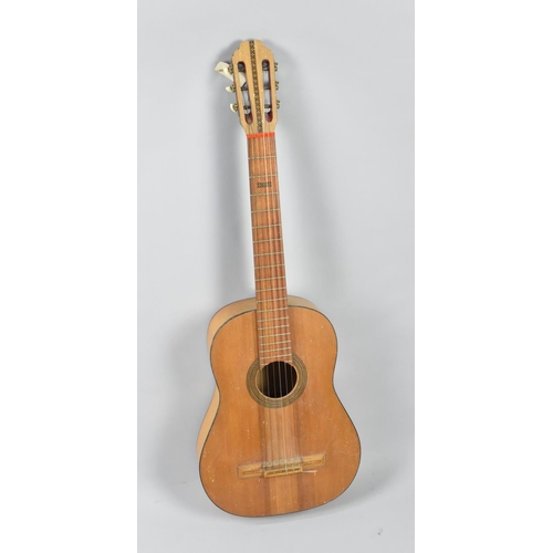 80 - A Childs Acoustic Guitar