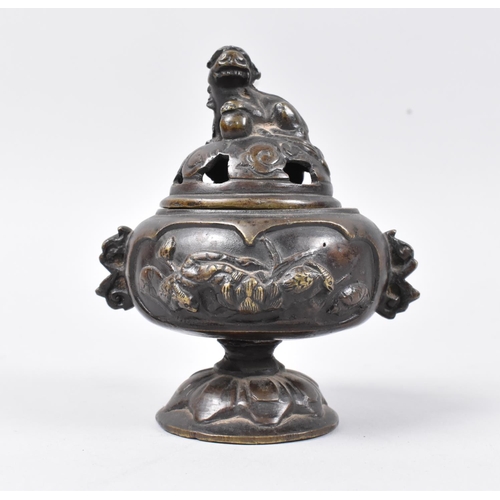 9 - A Chinese Patinated Bronze Censer with Relief Decoration to Body and Pierced Lid with Foo Dog Finial... 