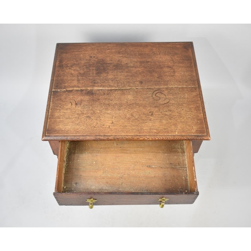 104 - An Oak Side Table on Short Supports, Single Drawer, 61x50x48cms High