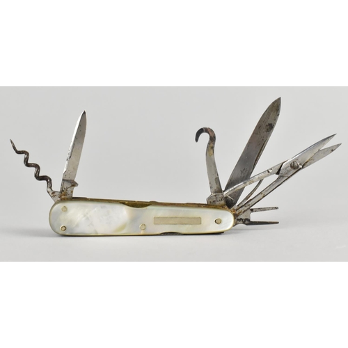 11 - An Early 20th Century Mother of Pearl Multitool Penknife by Christopher Johnson, Portobello Works, S... 