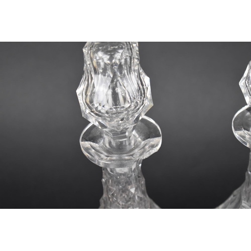 112 - A Pair of Late Victorian Cut Glass Decanters, 53cms High, Condition Issues