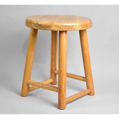 134 - A Circular Topped Stool, 35cms High