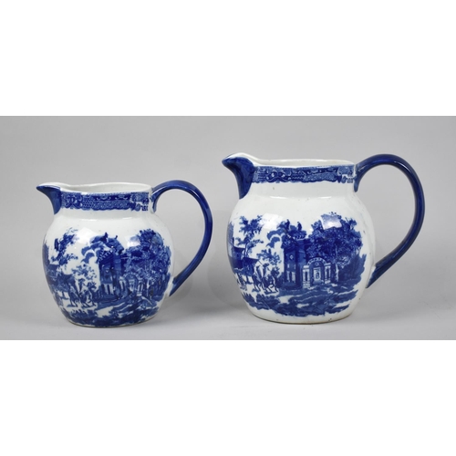 138 - Two Graduated Blue and White Transfer Printed Jugs