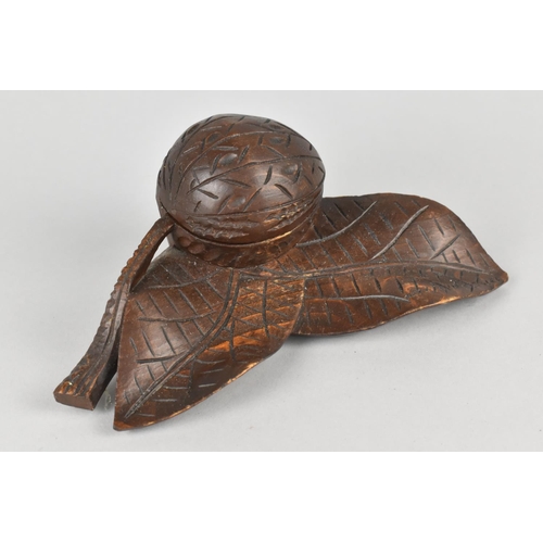 19 - A Late 19th/Early 20th Century Black Forest Type Treen Inkwell in the Form of a Nut and Leaves, 17cm... 