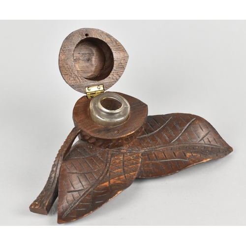 19 - A Late 19th/Early 20th Century Black Forest Type Treen Inkwell in the Form of a Nut and Leaves, 17cm... 