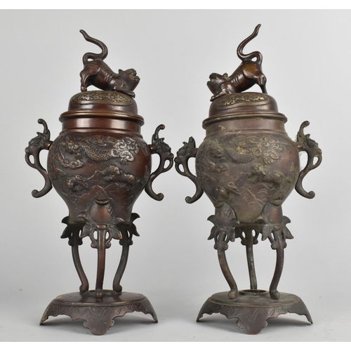 24 - A Pair of Japanese Bronze Koros, the Bodies with Relief Decoration Detailing Dragons Amongst Scrolls... 