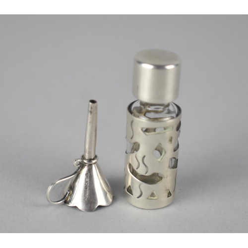 301 - A Small Silver and Glass Scent Bottle Together with Funnel, 4cm and 3cm High Together with a Silver ... 