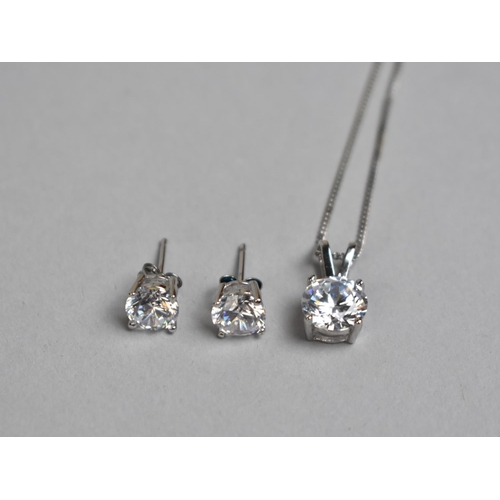 310 - A Boxed Suite of Silver and Claw Set Solitaire CZ Jewellery to comprise Pendant on Chain and Earring... 