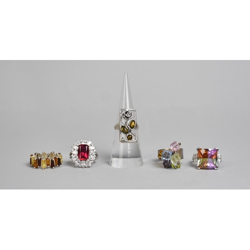 311 - A Collection of Five Various Silver rings to include Two Amber Mounted Examples and Three Jewelled E... 